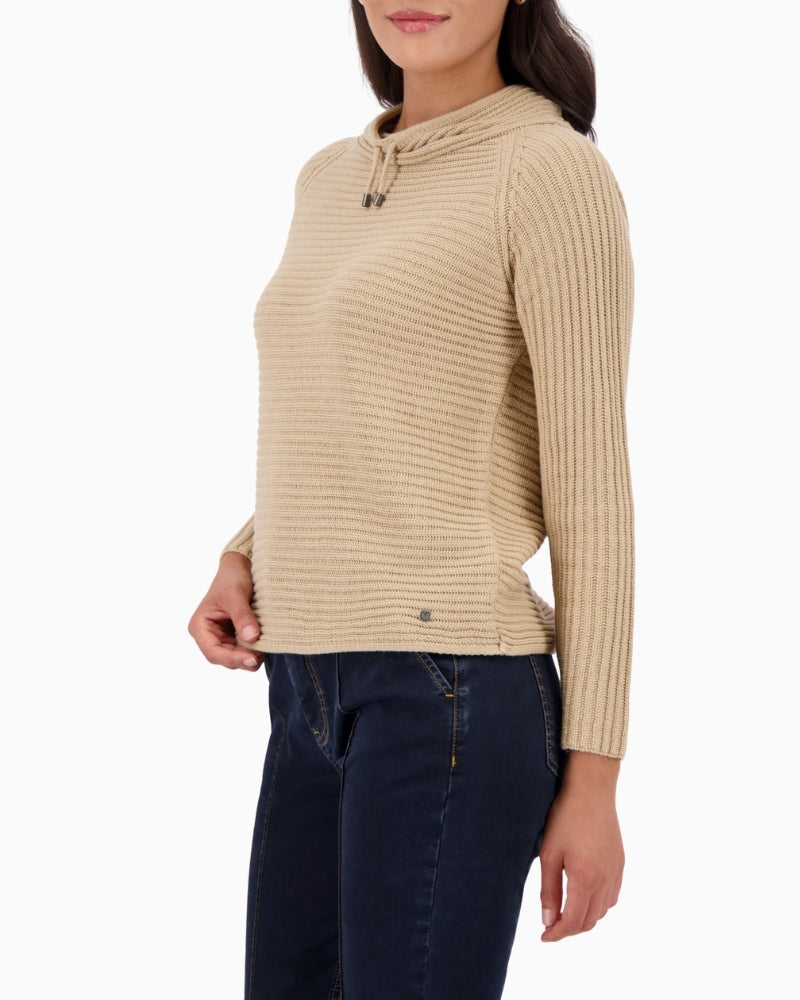 Side view of beige cotton knit sweater with ribbed texture by Monari