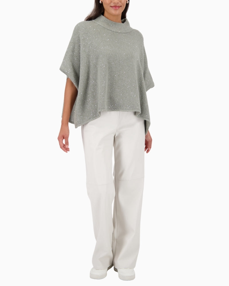 Monari soft sparkle cape in sage for layering over evening looks