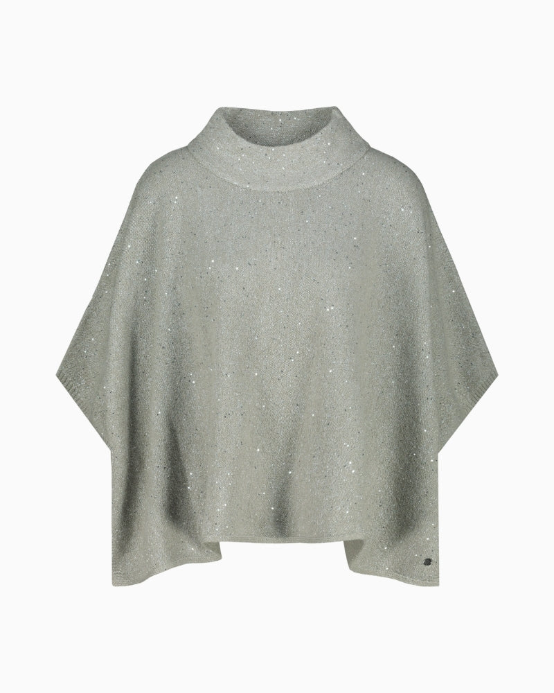 Front view of sparkly cape with stand-up collar and ¾ sleeves