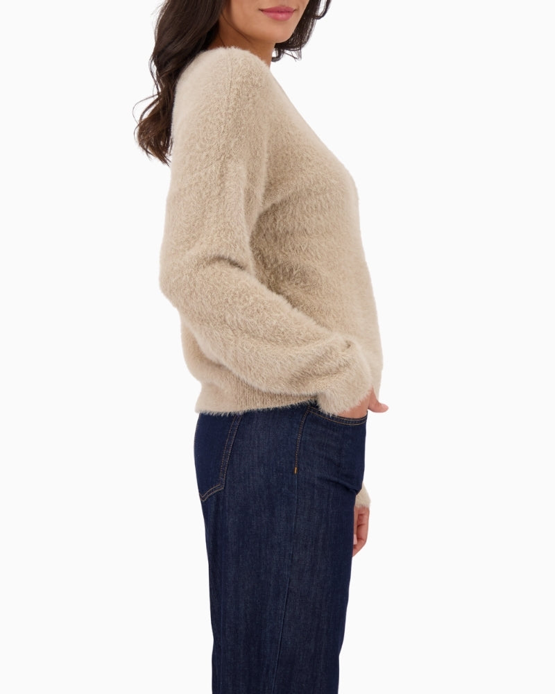 Side view of Relaxed-fit olive pullover with dropped shoulders and long sleeves
