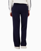 Back view of joggers showing patch pockets and flowing fabric