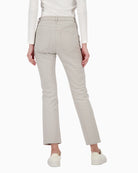 Back view of black leather-look trousers with patch pockets