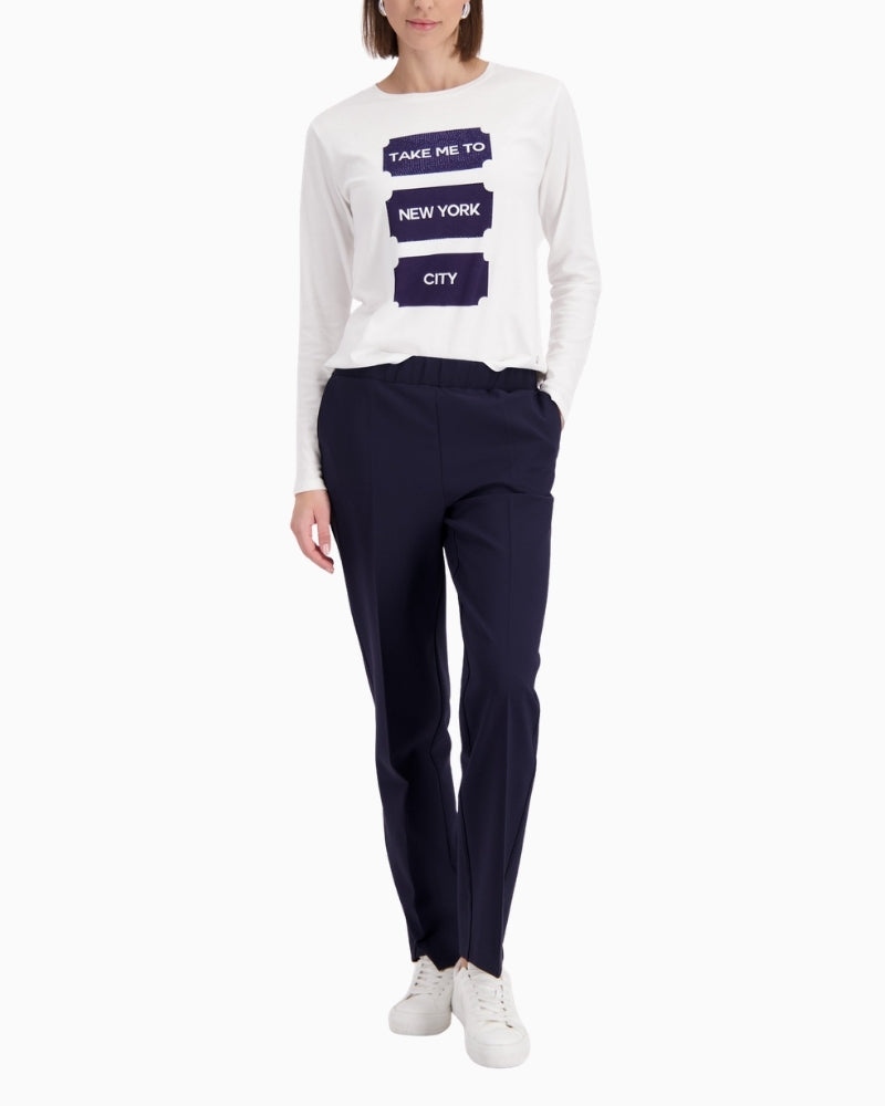 Monari straight leg trousers in navy, woman wearing front view – Áines Boutique