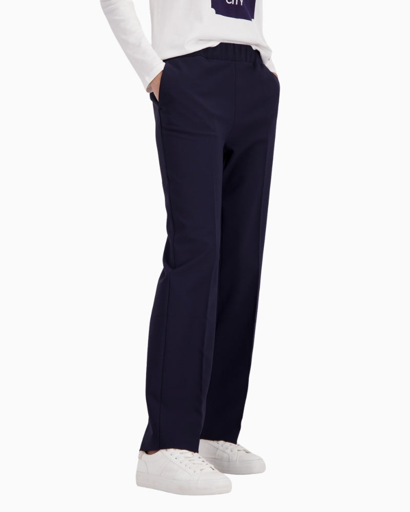 Monari straight leg trousers in navy, woman wearing side view – Áines Boutique