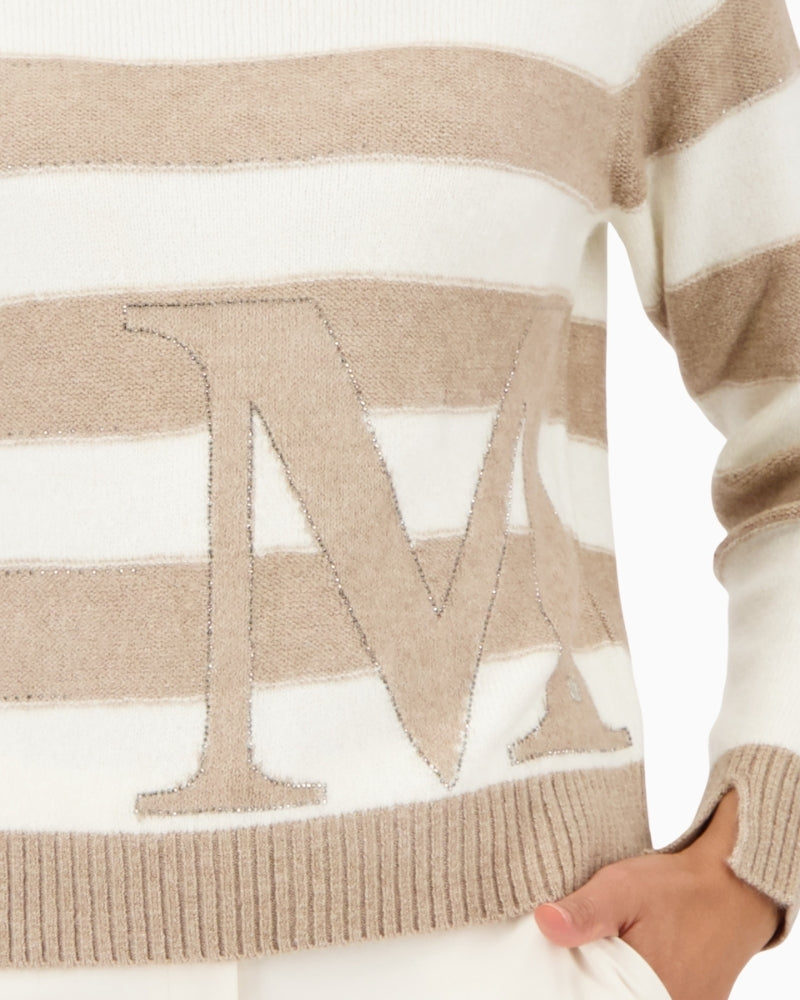 Detail of intarsia knit and rhinestone pattern on soft viscose blend jumper