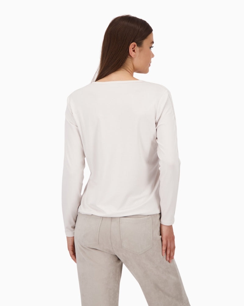 Back view of beige blouse with soft stretch material