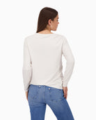 Back view of long sleeve neutral top with regular fit