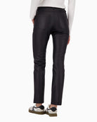 Back view of leather-look trousers with patch pockets