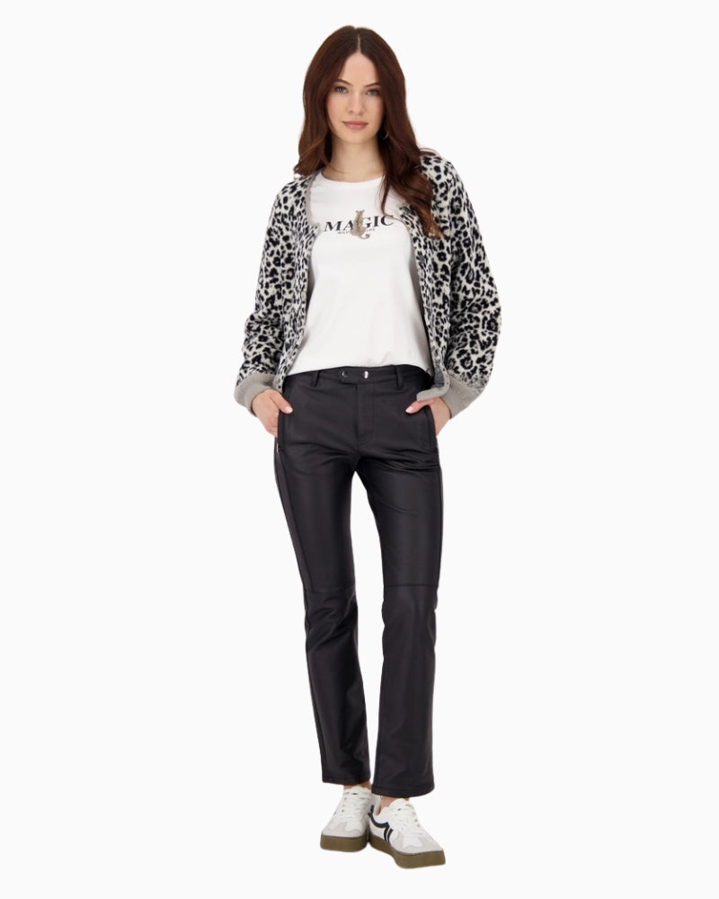 Model wearing straight-leg black trousers with shoes and jumper