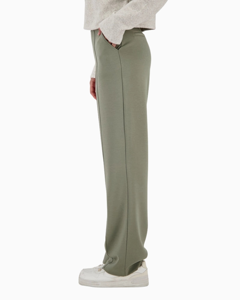 Monari pants with lettering band side view on woman wearing them – Áines Boutique