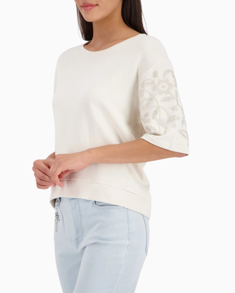 Woman wearing Monari Sweatshirt With Pearl Embellishment side profile – Áines Boutique