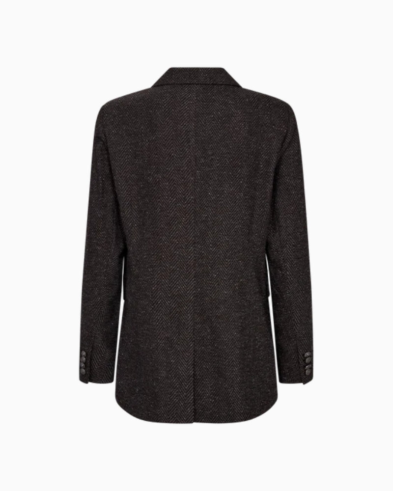 Back view of oversized Mos Mosh blazer with soft drape and tailored seams