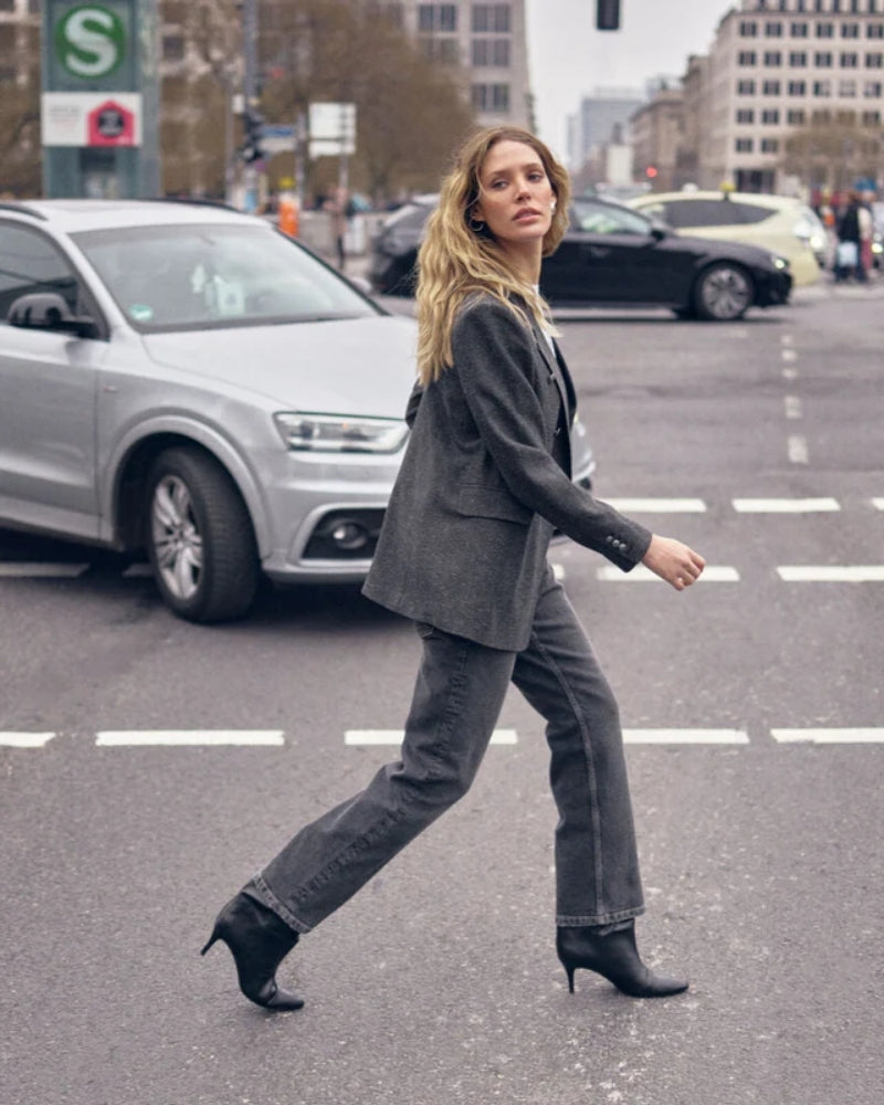 Side view of Mos Mosh oversized double-breasted blazer in neutral tone with embossed buttons
