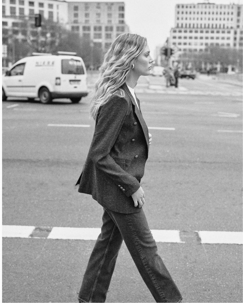 Side view of Mos Mosh oversized double-breasted blazer in neutral tone with embossed buttons