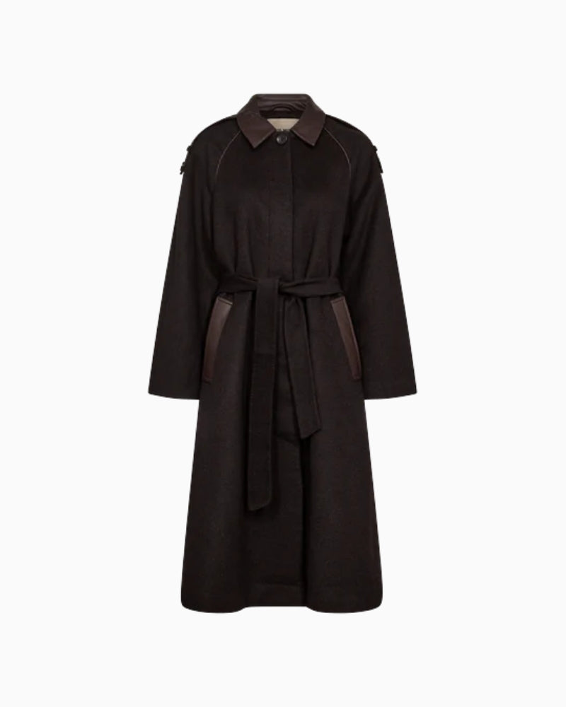 Front view of Eva wool coat showing classic collar, concealed buttons, and waist belt