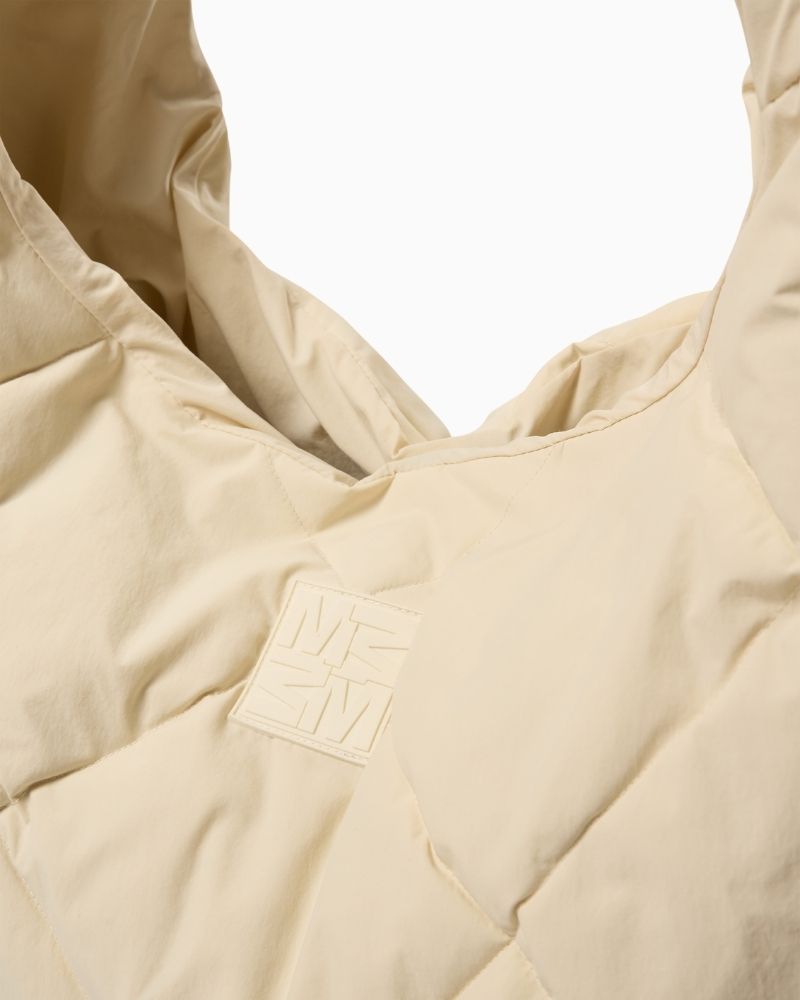 Stylish black puffer-style bag by Mos Mosh with clean, modern lines