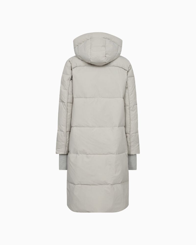 Back view of Ollie Terma long coat styled for cold weather