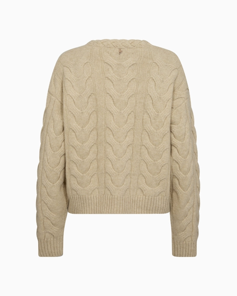 Back view of Mos Mosh cardigan showing ribbed hem and relaxed fit