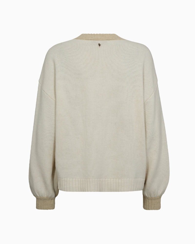 Back view of oversized wool jumper with plain knit and ribbed hem