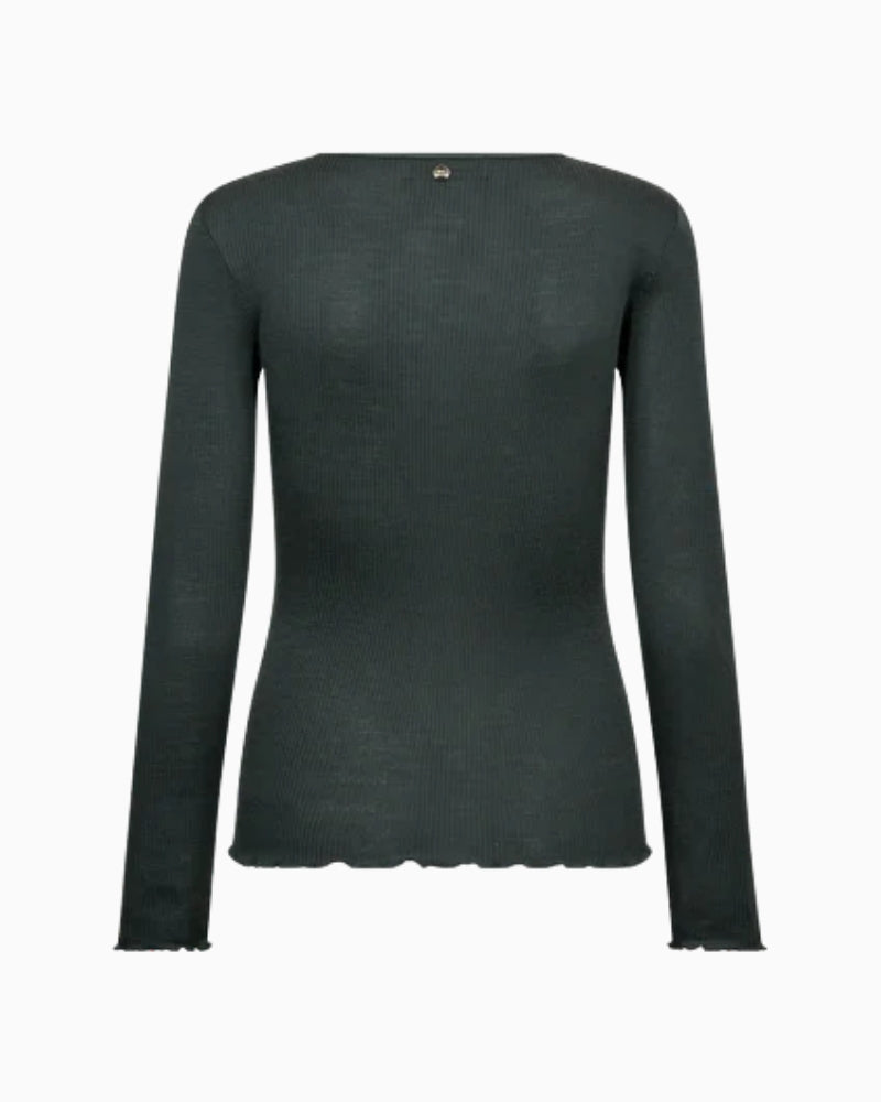 Back view of slim-fit long sleeve top with seamless finish