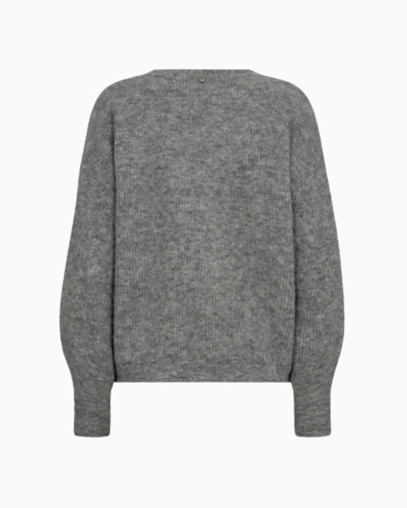 Back view of cropped wool cardigan with fine knit texture