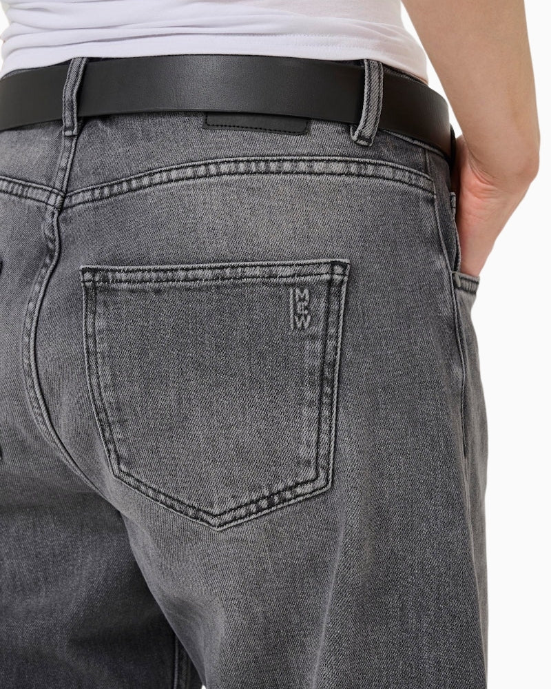 Close-up of denim texture and waistband on BalooMW jeans