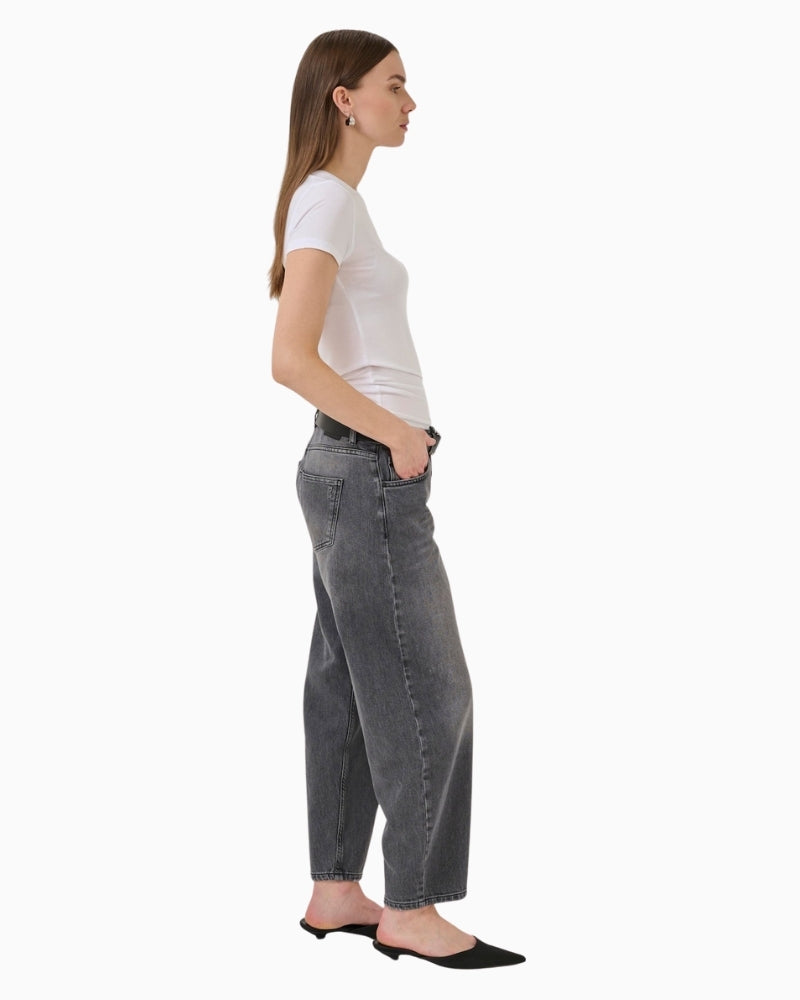 Side profile of structured denim jeans with slight stretch
