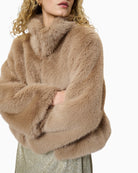 Close-up of spread collar and soft textured faux fur