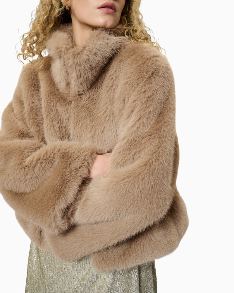 Close-up of spread collar and soft textured faux fur