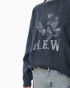 Close-up of vintage-style cotton texture and neckline on DiegoMW sweatshirt