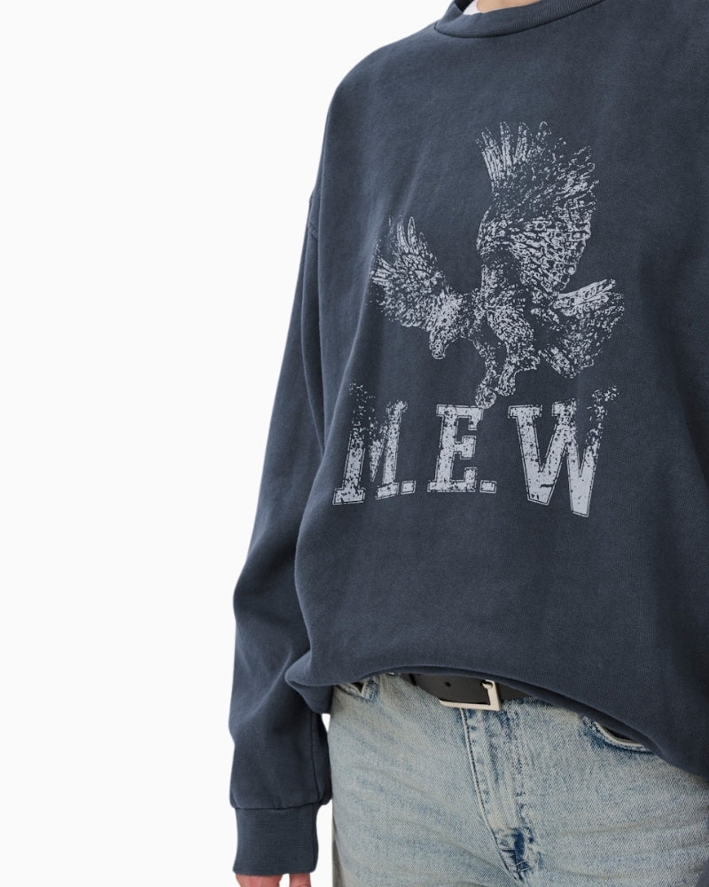 Close-up of vintage-style cotton texture and neckline on DiegoMW sweatshirt