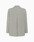 Back view of tailored blazer showing soft seam shaping