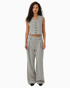 Model styling trousers with matching Disa waistcoat
