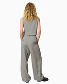Back view showing tailored seams and relaxed leg shape