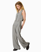 Full outfit showing wide-leg silhouette and high-rise waistband