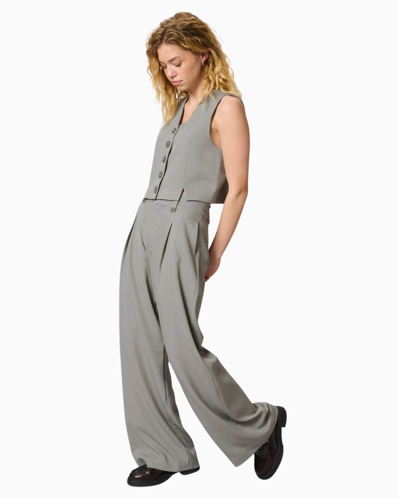 Full outfit showing wide-leg silhouette and high-rise waistband