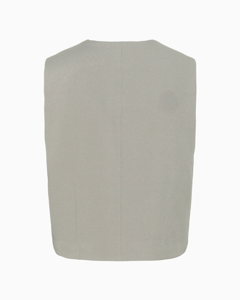 Back view of tailored vest with clean seam detailing