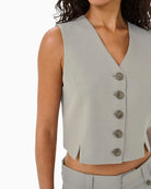 Close-up of button front and soft stretch fabric