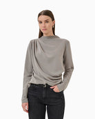 Draped Moon Mist blouse by My Essential Wardrobe with long sleeves and high neck