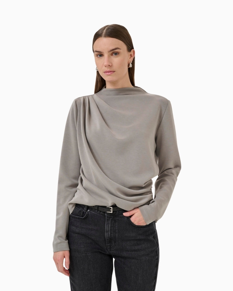Draped Moon Mist blouse by My Essential Wardrobe with long sleeves and high neck