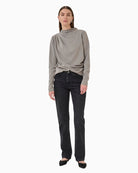 Draped Moon Mist blouse by My Essential Wardrobe with long sleeves and high neck