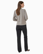Back view of hip-length TENCEL™ blend blouse with smooth silhouette