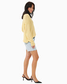 Side view of loose fit summer shorts with short length and clean finish