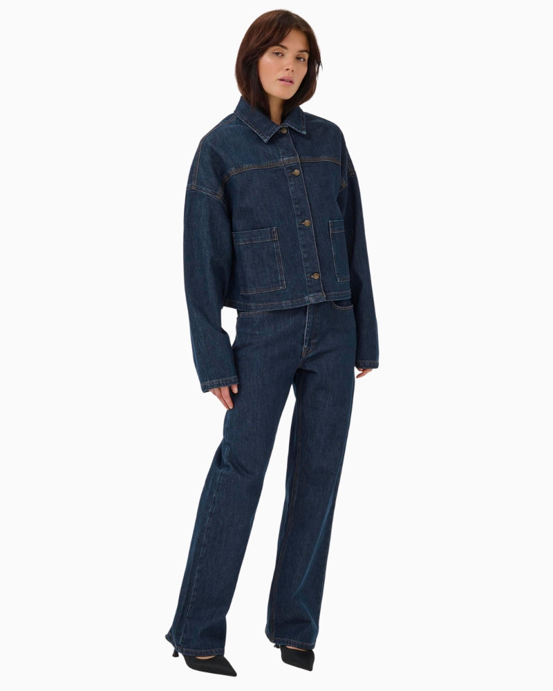 My Essential Wardrobe denim jacket styled with neutral trousers for everyday wear