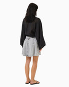 Back view of MalouMW skirt showing fitted waistband and cotton texture