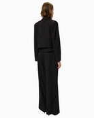 Back view of cropped tailored blazer showing clean seams