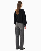 Back view of Siva pullover showing ribbed hem and hip-length fit