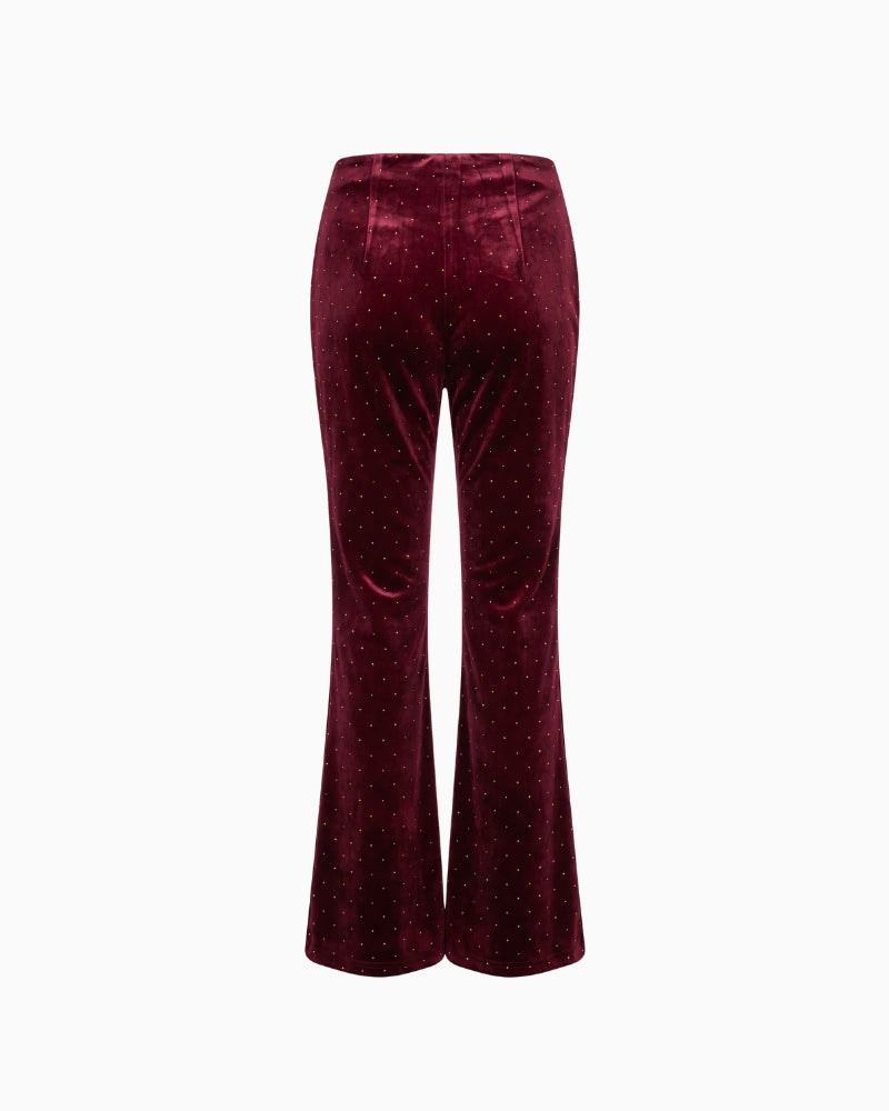 Never Fully Dressed Velvet Flared Trousers in Burgundy back view showing flared legs and velvet finish