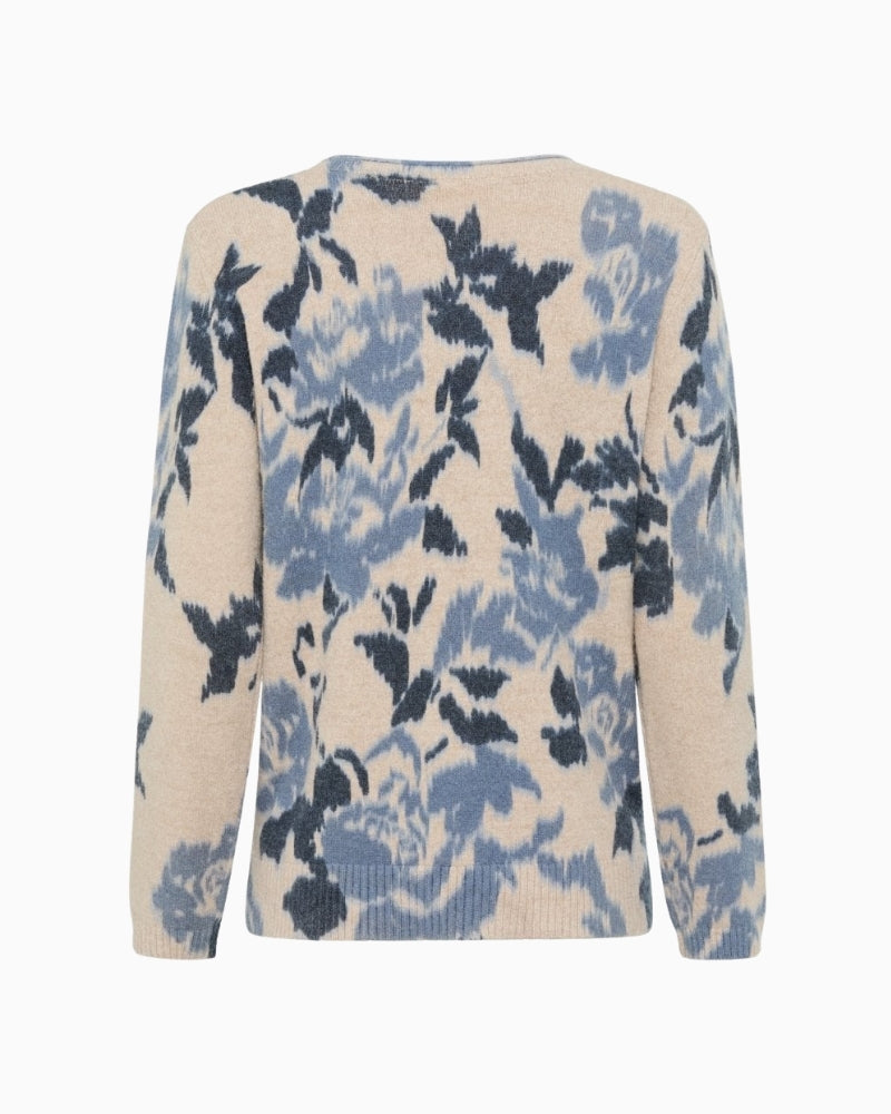 Back view of Blue Haze sweater showing solid colour and relaxed fit