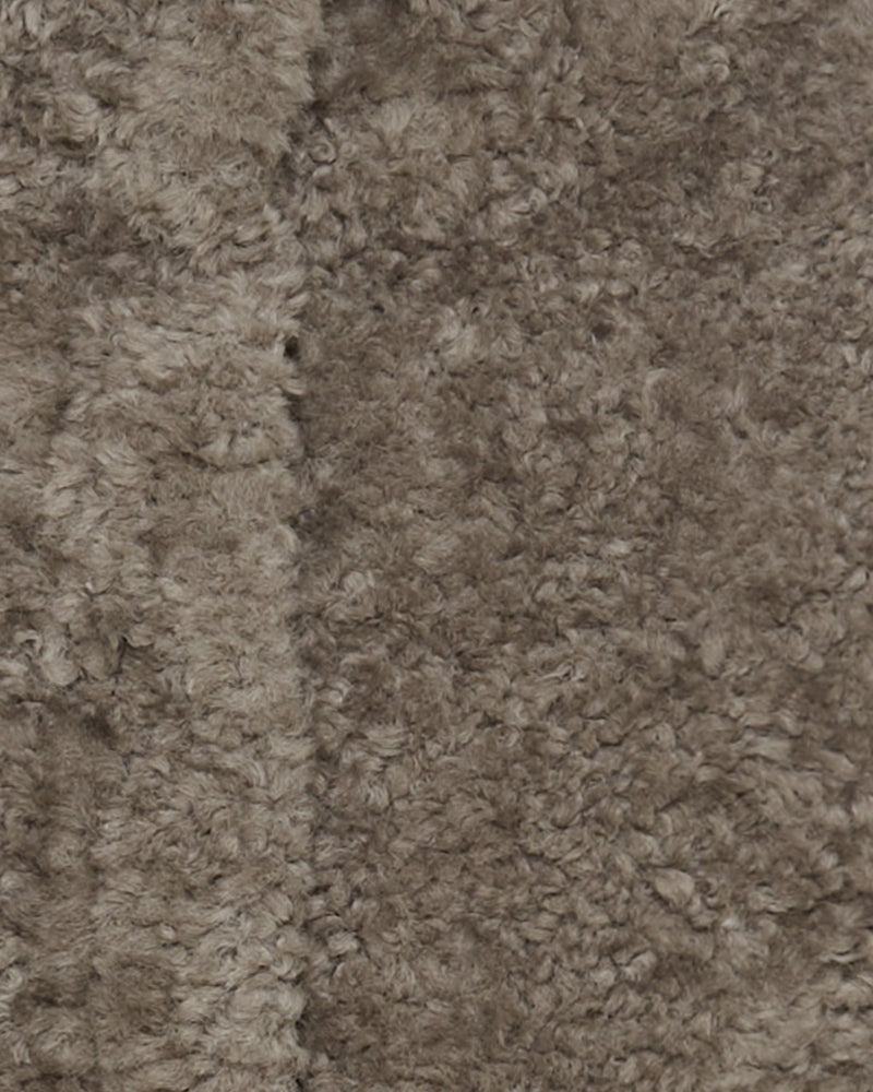 Close-up of smooth taupe polyester fabric